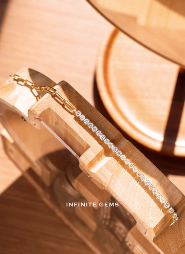 Half tennis, half paperclip chain bracelet in 18K yellow gold, set with 2.4ct of round brilliant lab grown diamonds, worn on the wrist