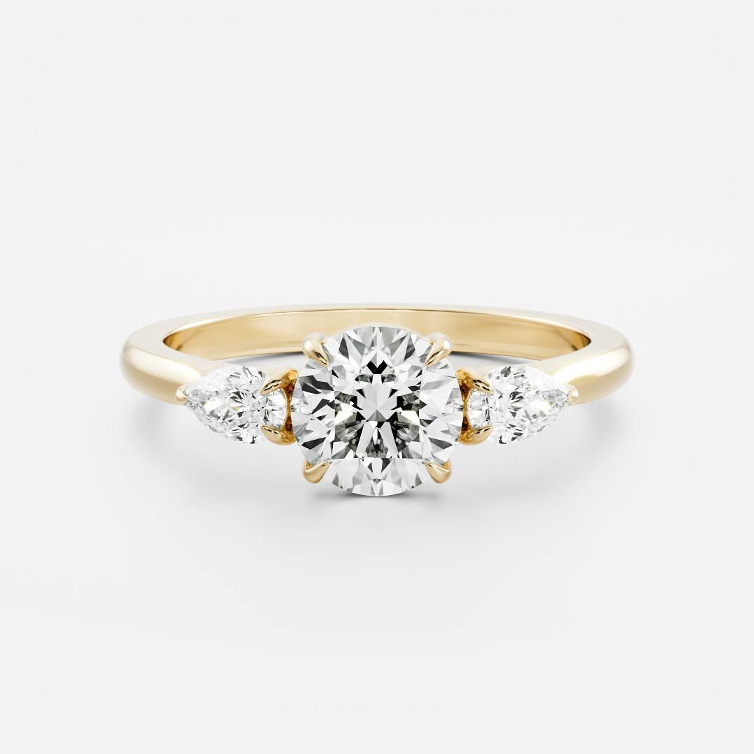 Round and pear lab-grown diamond trilogy ring — lab grown vs natural diamonds — Infinite Gems
