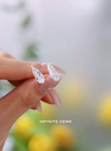 Elongated Step Cut Pear Lab Diamond Stud Earrings