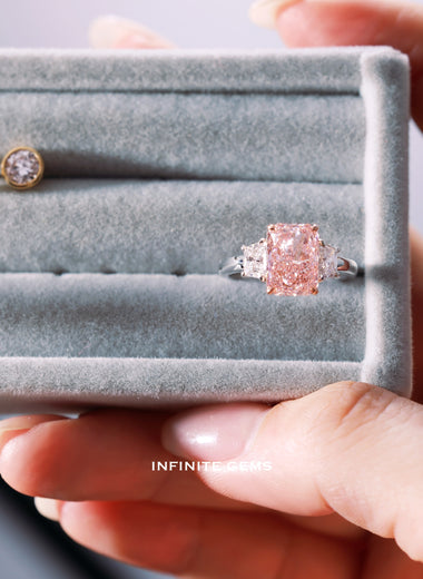 Radiant Cut Fancy Vivid Pink Ring - Brilliant Trapezoid 3 Stone Setting - Infinite Gems Limited