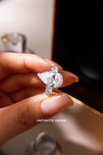 Pear cut lab grown diamond three-stone trilogy engagement ring in 18K white gold — Infinite Gems