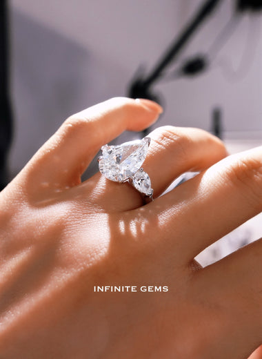 Pear lab grown diamond trilogy ring with pear-shaped side diamonds — Infinite Gems
