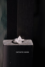Pear Shape Ring - Tapered Baguette 3 Stone Setting