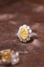 Oval Fancy Vivid Yellow Ring - Fancy Halo Setting