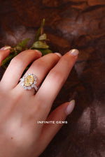 Oval Fancy Vivid Yellow Ring - Fancy Halo Setting